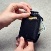 تصویر  کیف پول برند Vaultskin   دارای حفاظ  RFID  رنگ مشکی Vaultskin Notting Hill zip wallet with RFID protection (Black)