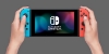 تصویر  کنسول بازی دستی نینتندو  Nintendo Switch Extended Battery Life With Neon Blue And Neon Red Joy‑Con